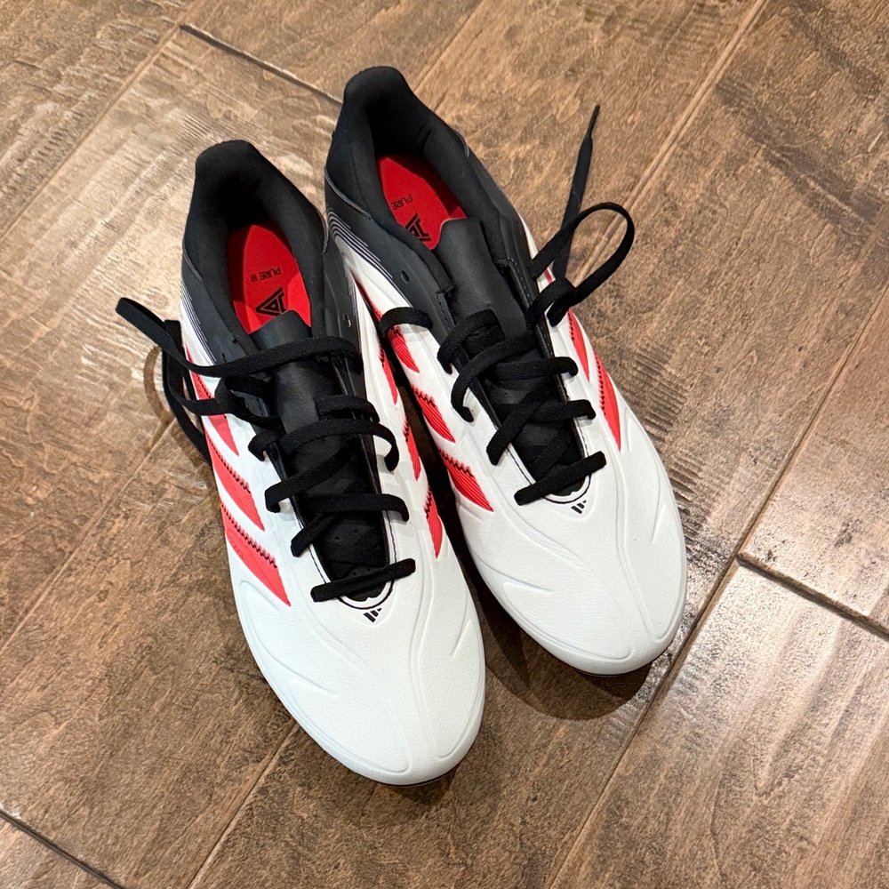 Adidas White and Black Soccer Cleats with Red Highlights